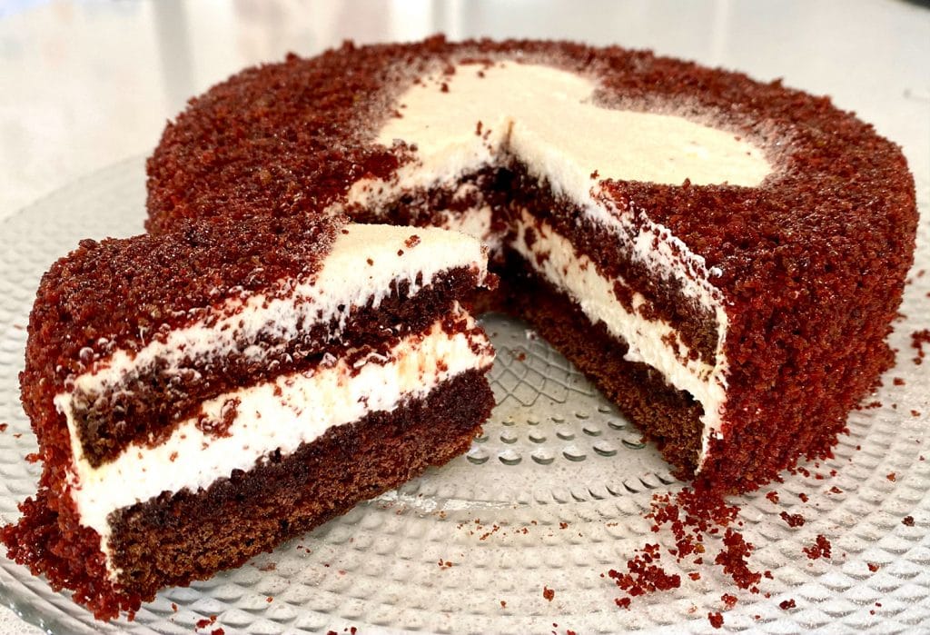 A slice of red velvet cake